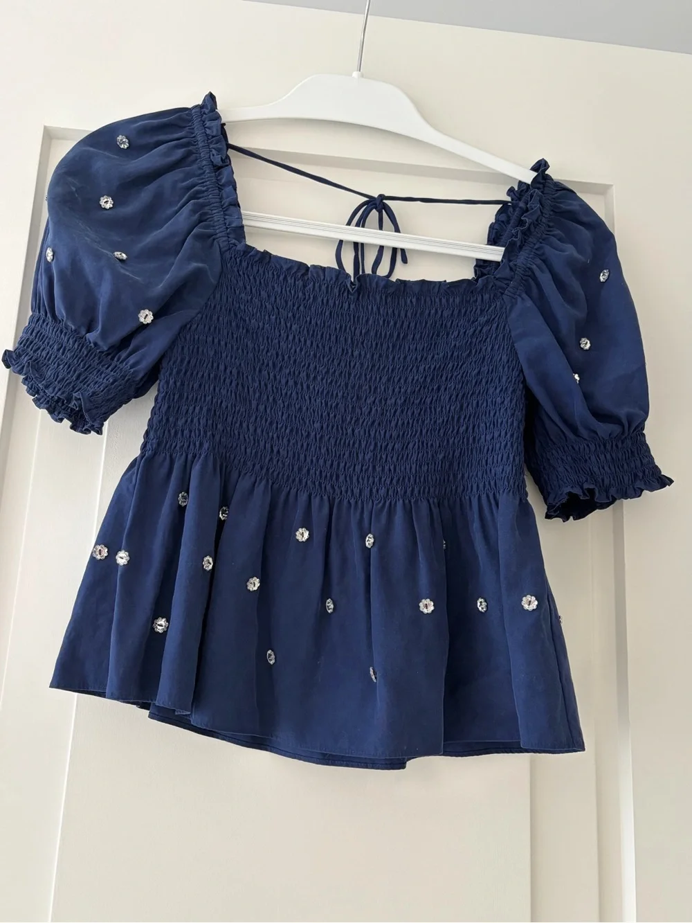 Hill House Navy Smocked Puff-Sleeve Top with jewel detailing